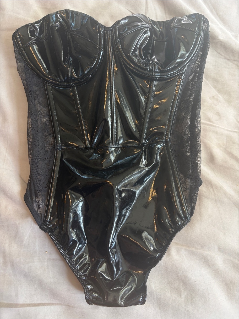Black vinyl and lace bustier bodysuit